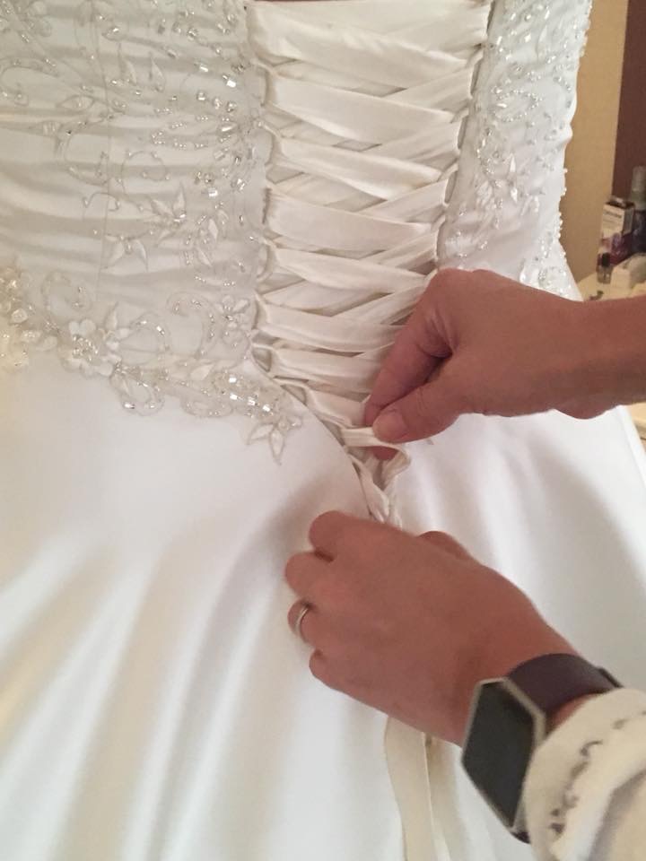 Lacing up the dress