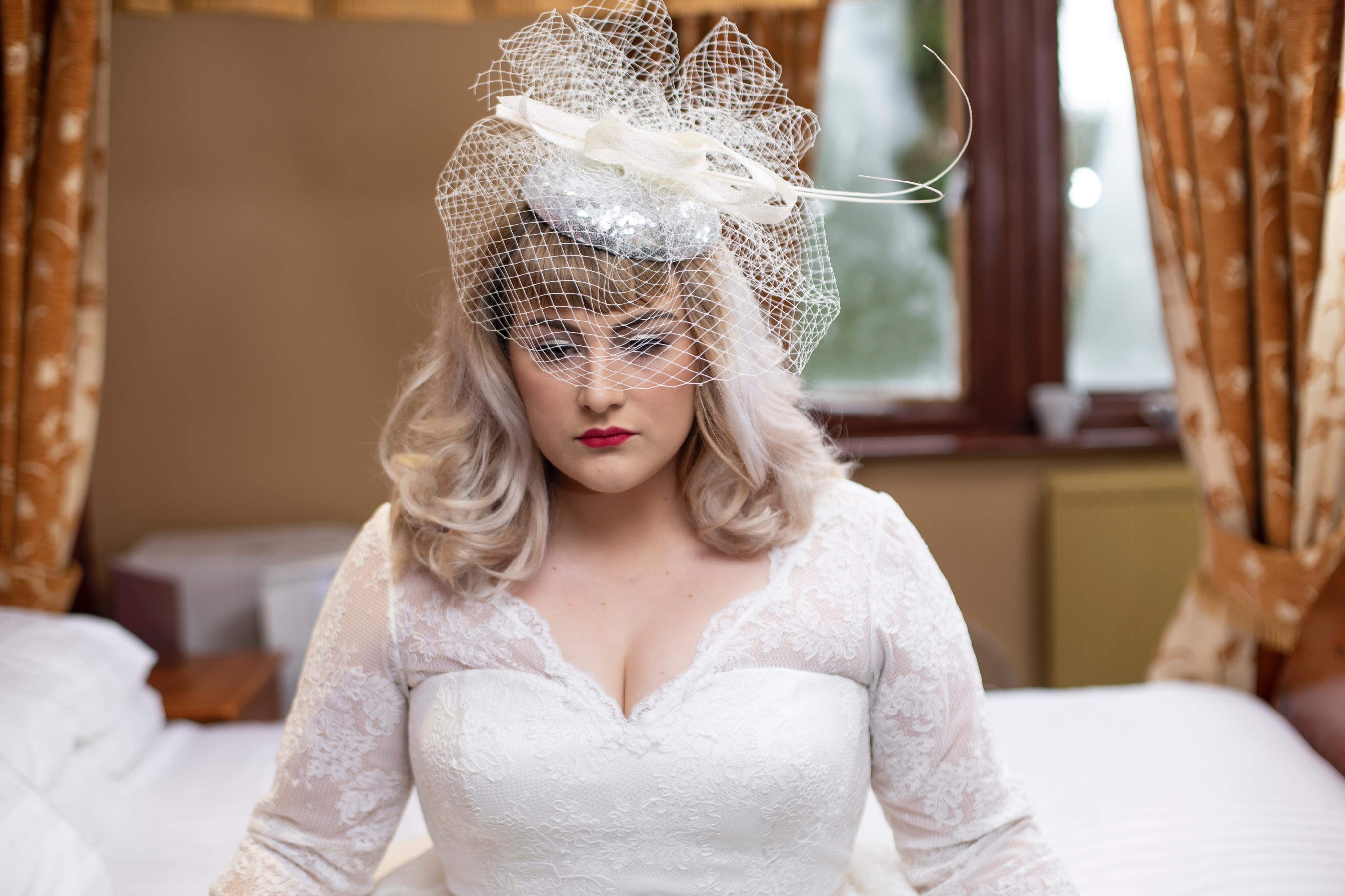 Vintage hair style with birdcage vail 